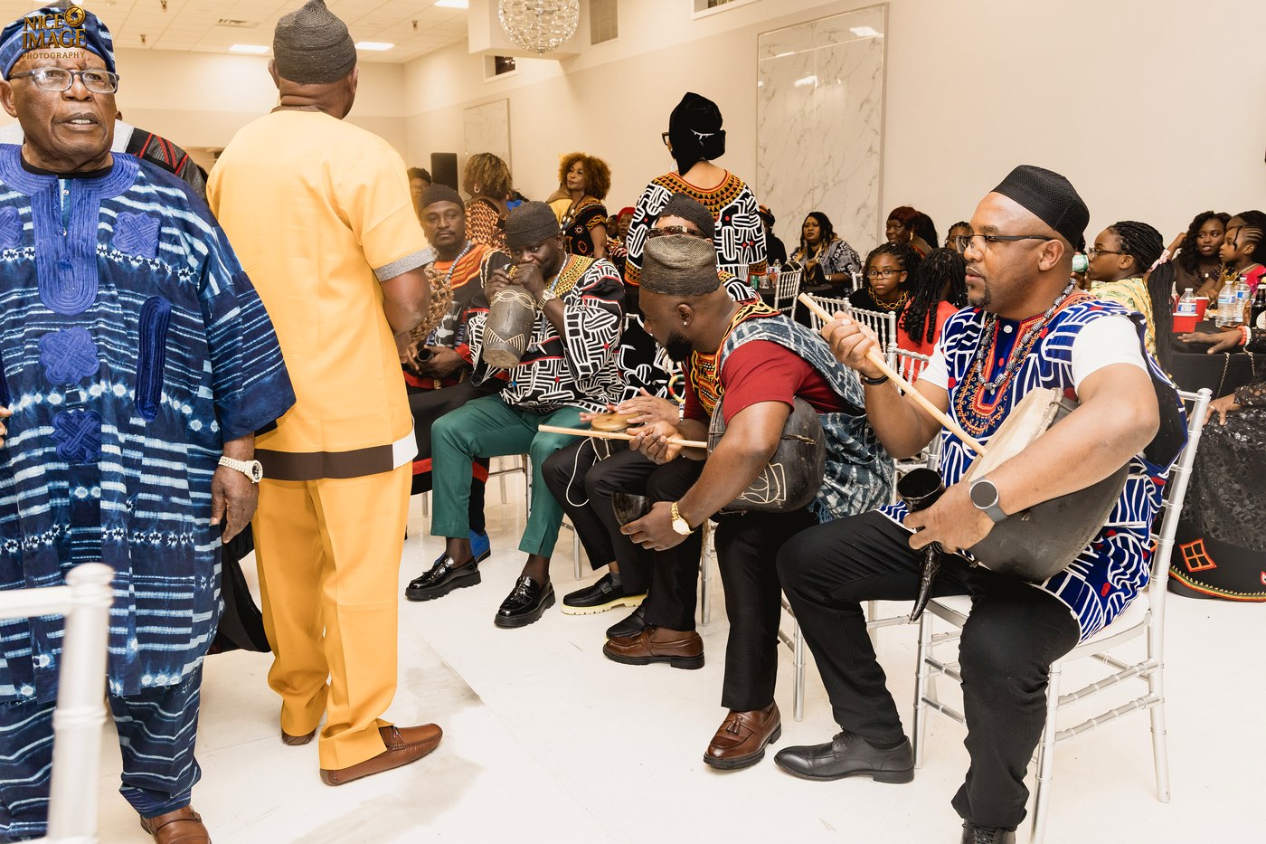 Musicians playing traditional drums during the Ndo Chiehsi celebration