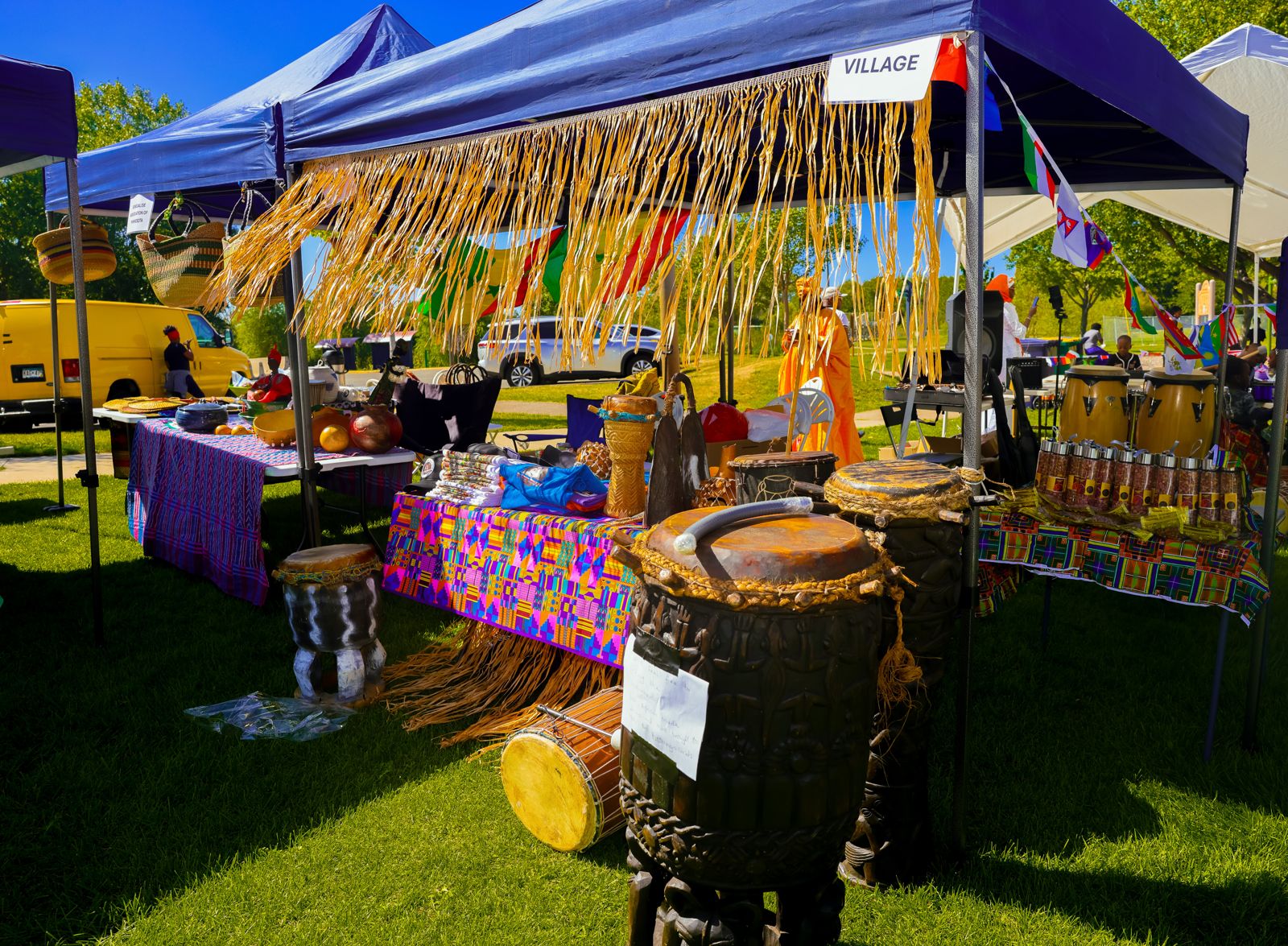 The Village tent with carved traditional drums, gongs and shakers on display