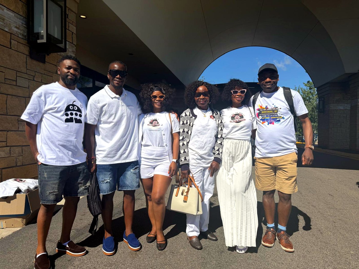 BotangRecords group in matching white shirts before boarding the Mississippi River cruise