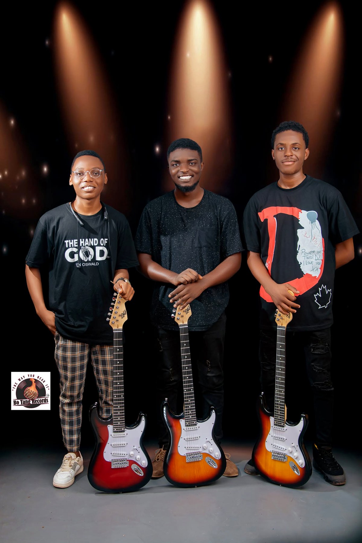 The first three Guitar Contest winners with their new guitars