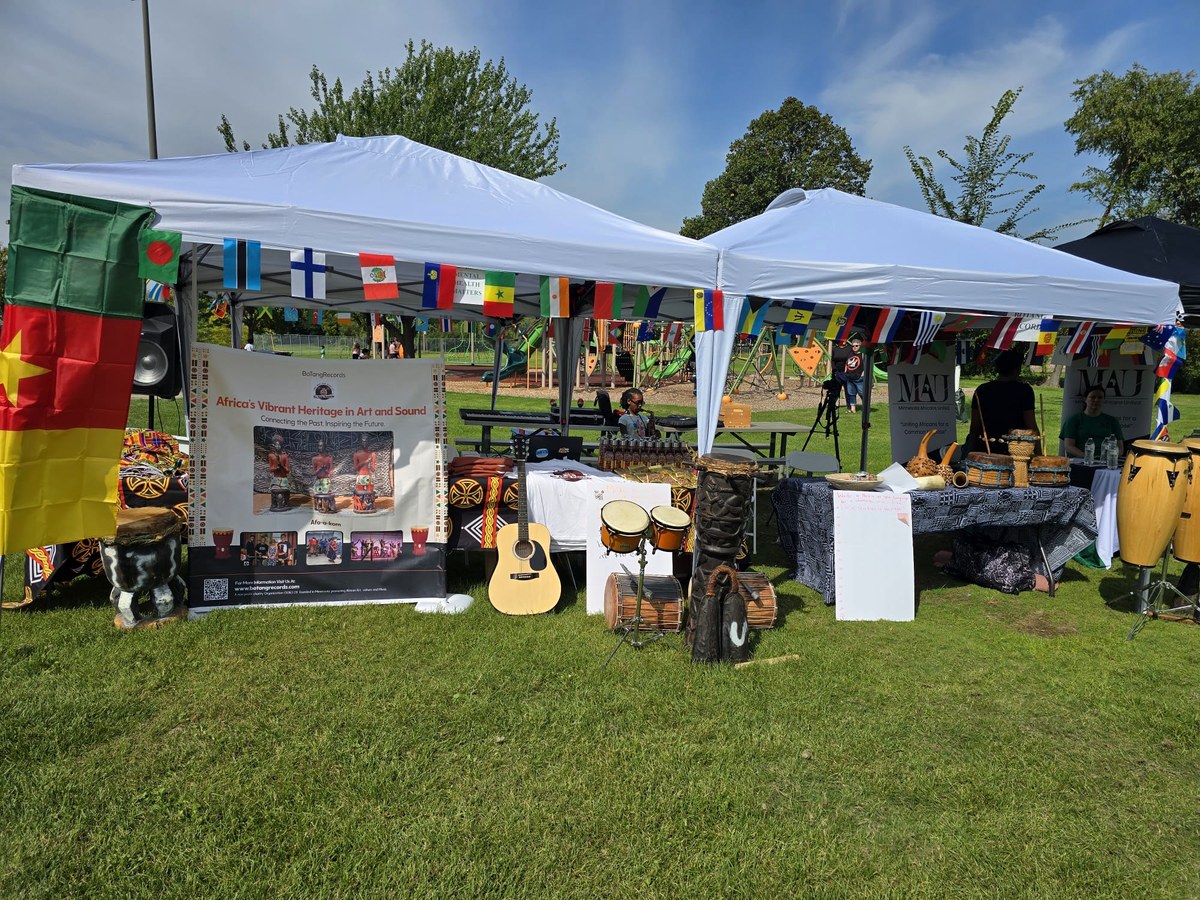 BotangRecords' booth with drums, guitar, and display banner