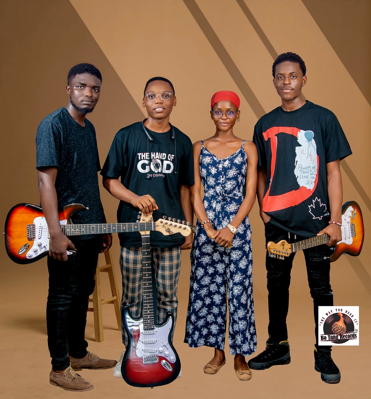 All four Guitar Contest winners with their guitars